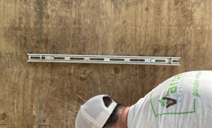 Unistrut with twist key installed on wall