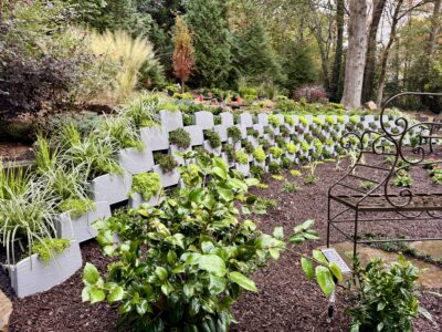 Varden plantable retaining wall blocks in landscape wall