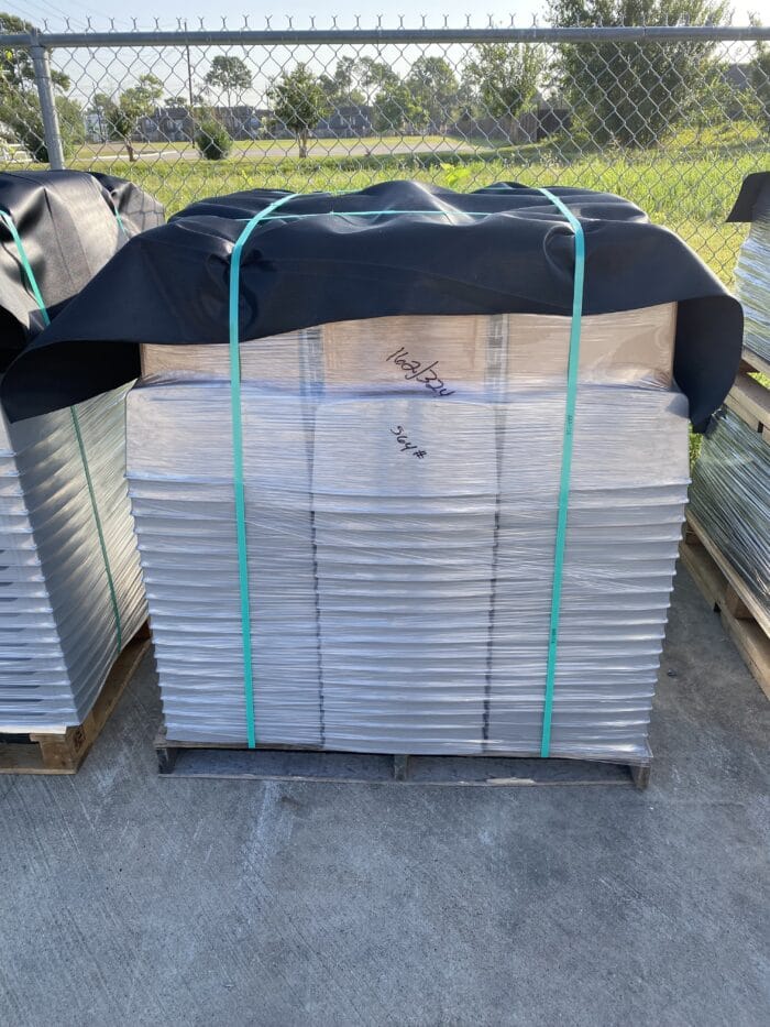 Short pallet of Varden blocks with side rails on top