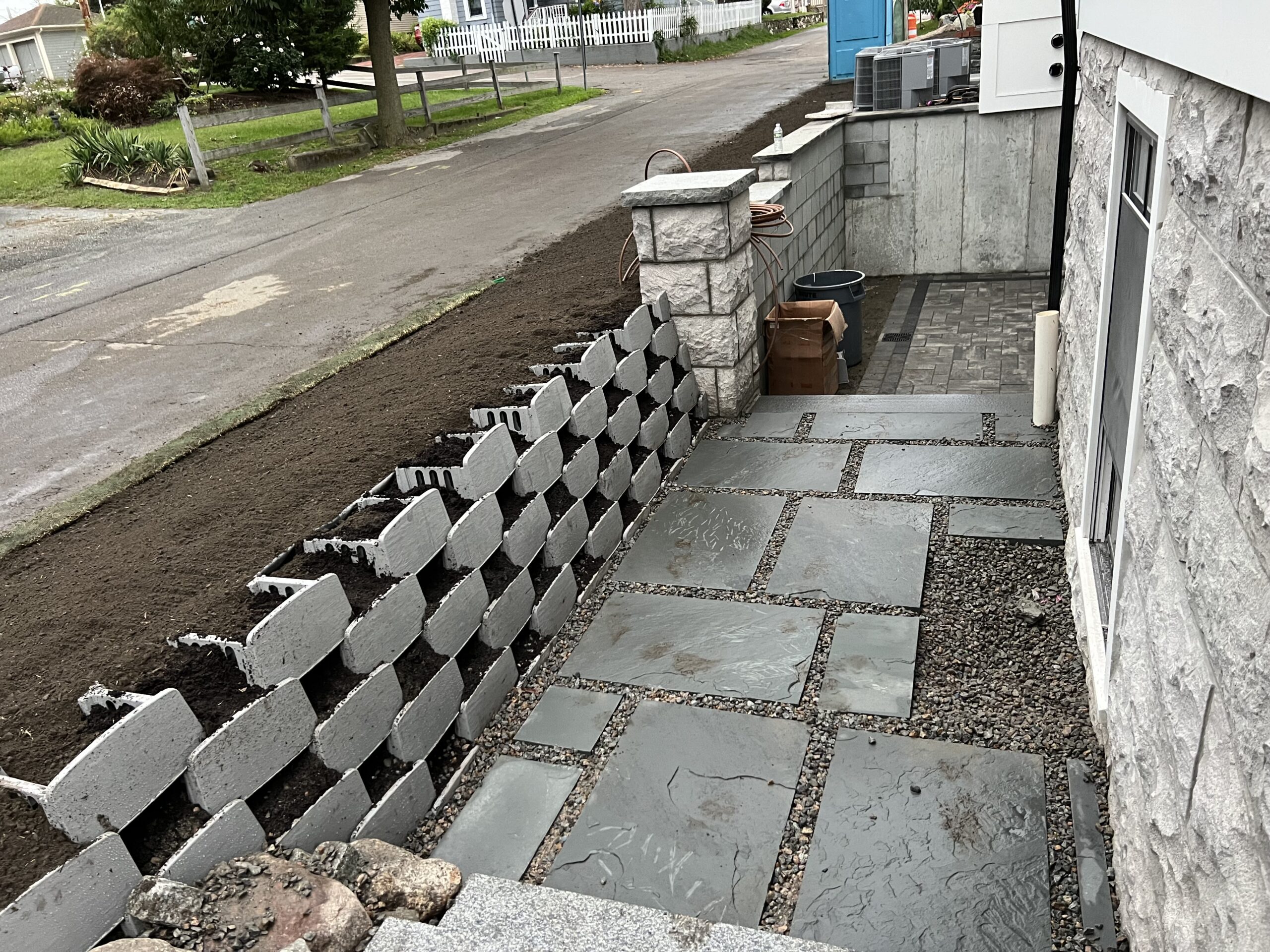 Newly constructed retaining wall with plantable blocks