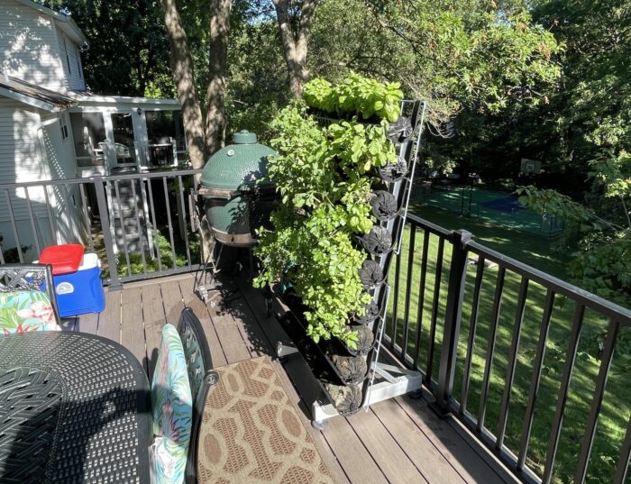 Varden freestanding vertical garden rack on a balcony
