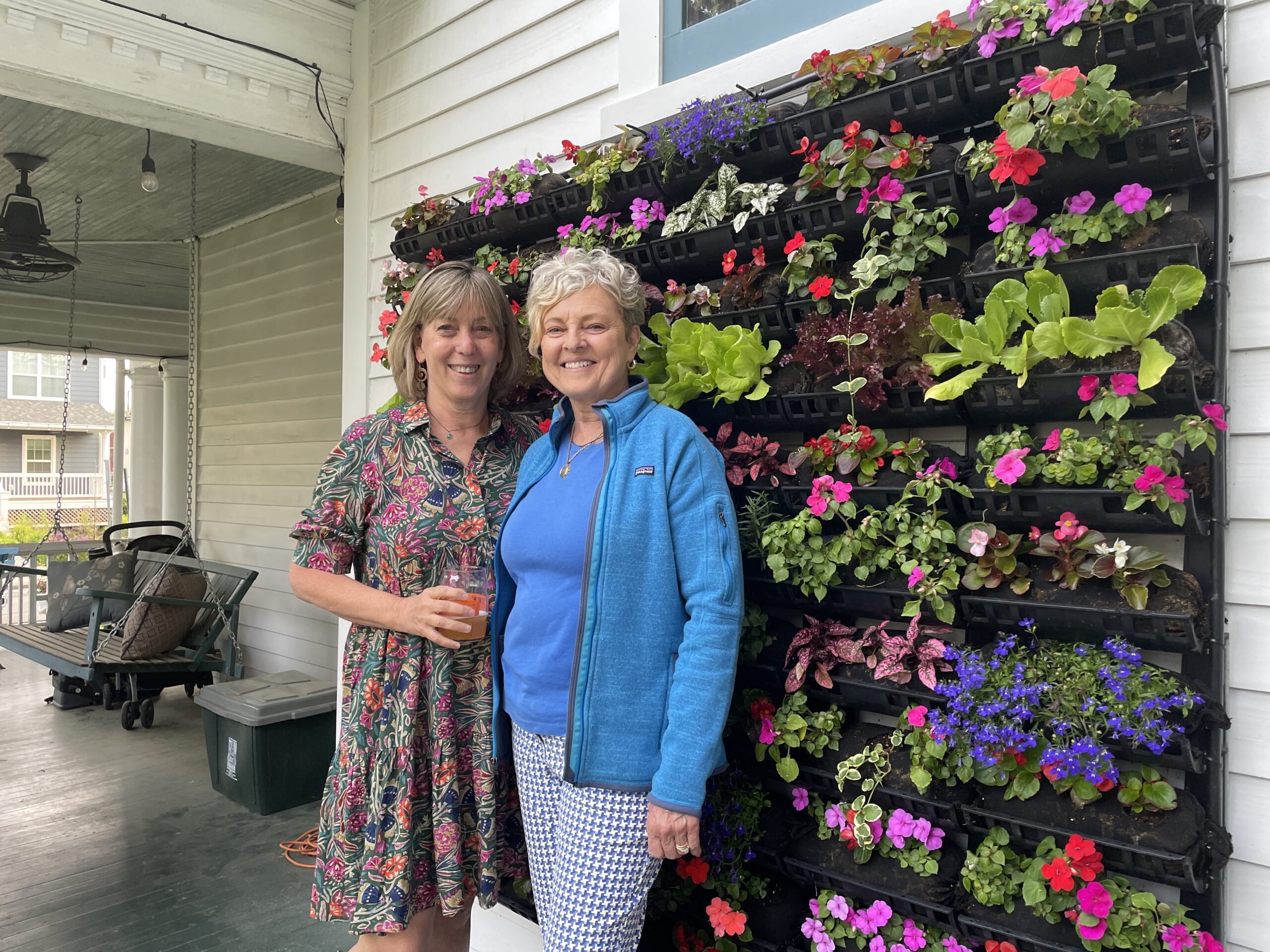 Living Wall designers in front of latest vertical garden creation