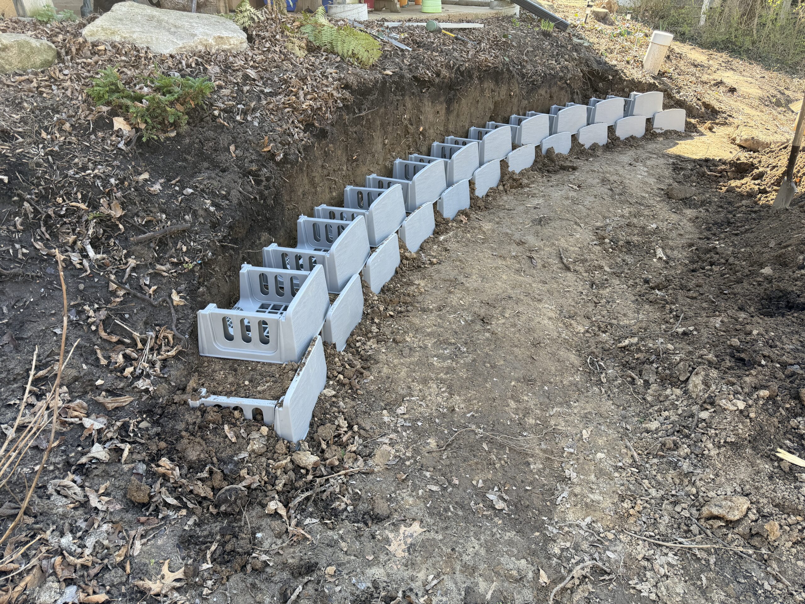 Small Varden plantable retaining wall during DIY construction on a patio