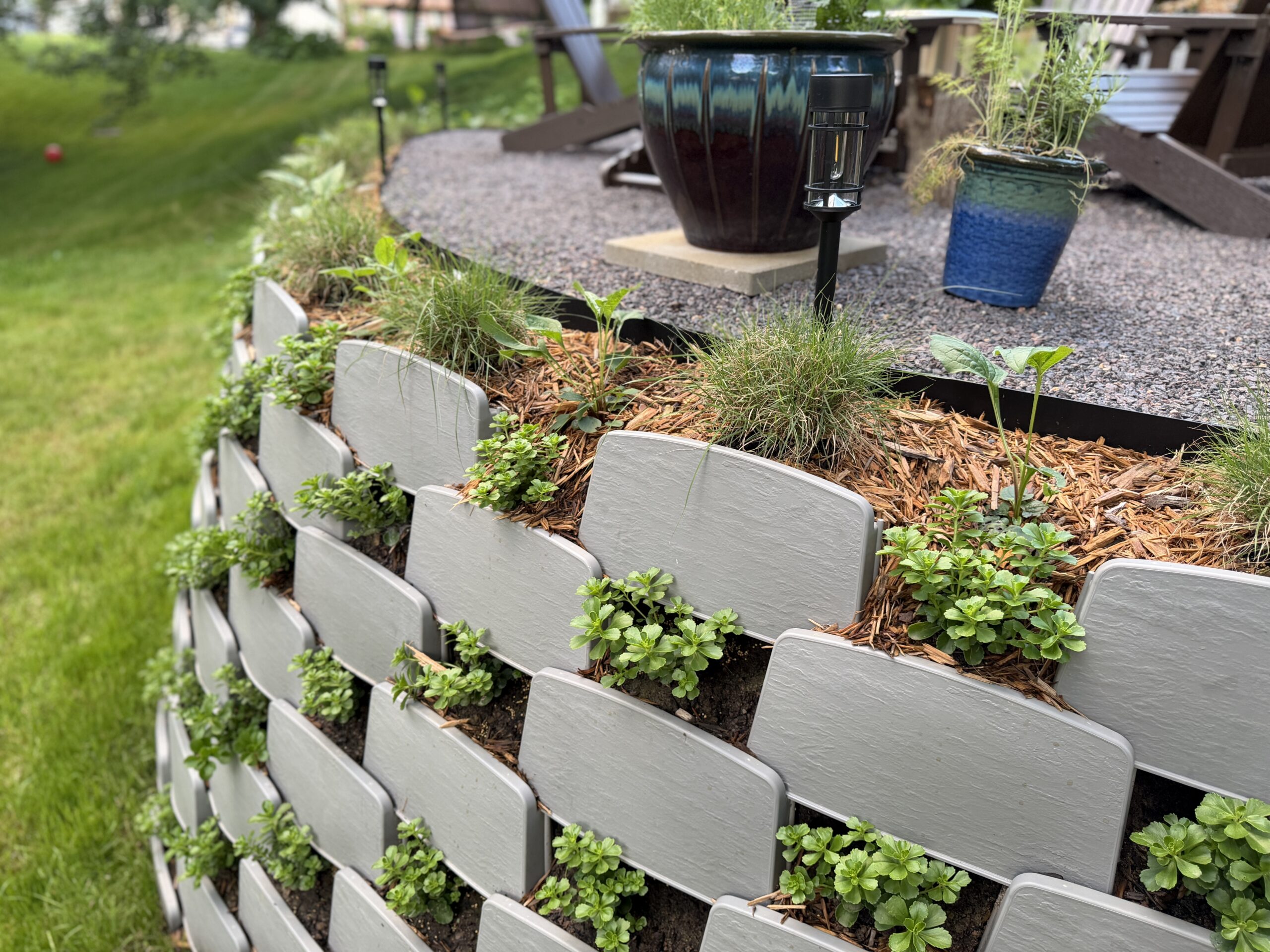 Planted Varden living retaining wall on patio